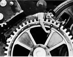 Photo of Charlie Chaplin in a Scene from Modern Times
