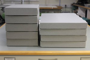 Fig 13: The manuscript fragments and bindings conserved, housed and pack in archival boxes, ready to be returned to the University Library.