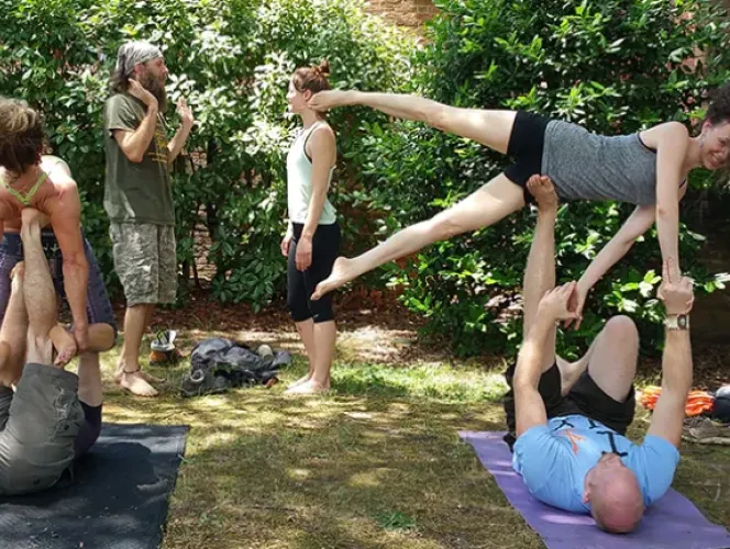 People doing yoga together outdoors in Richmond USA in 2015  Credit: Eli Christman via Flikr under a cc license