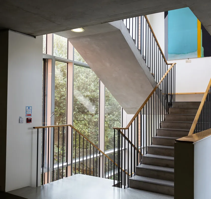 staircase with abstract art