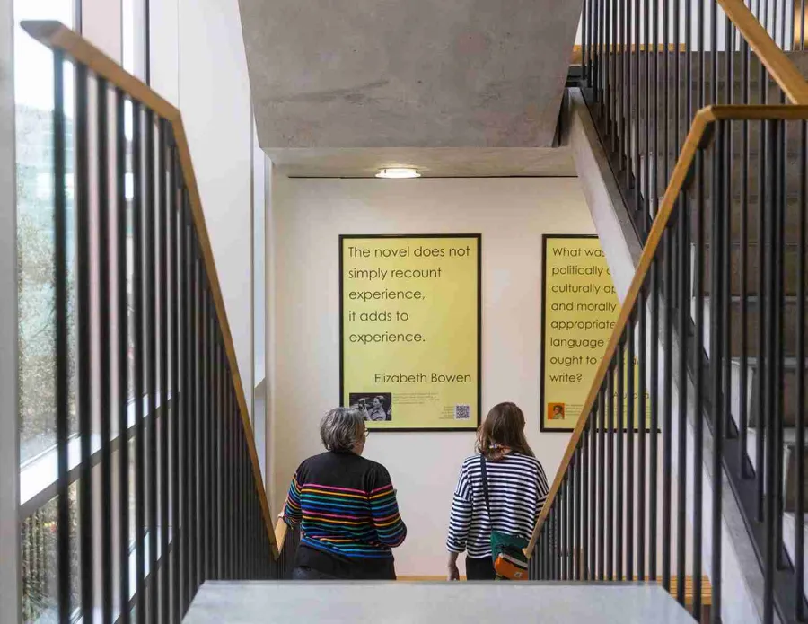 two people walking down the stairs